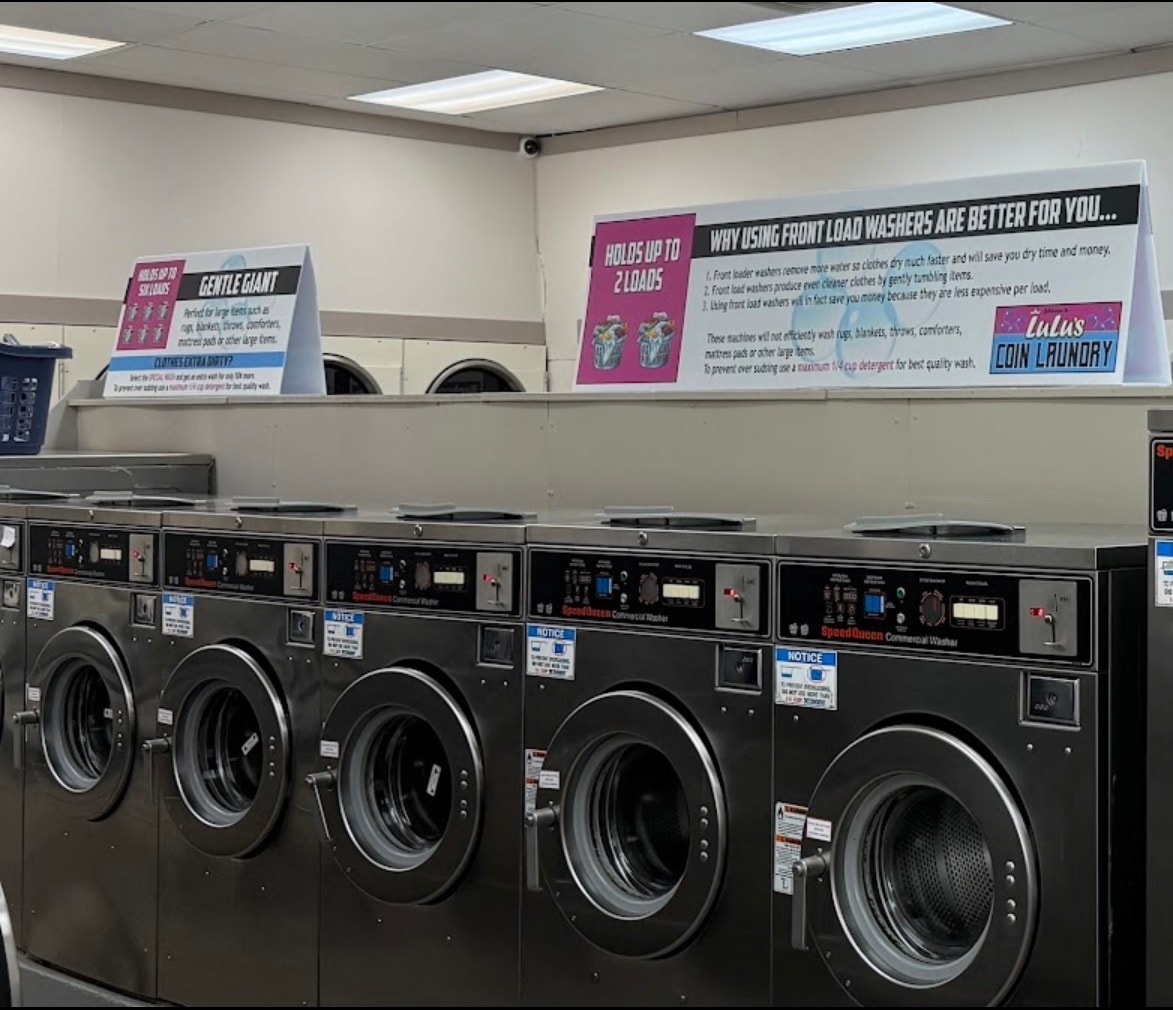 LuLu's Coin Laundry — Speed Queen commercial washers with machine guide signage